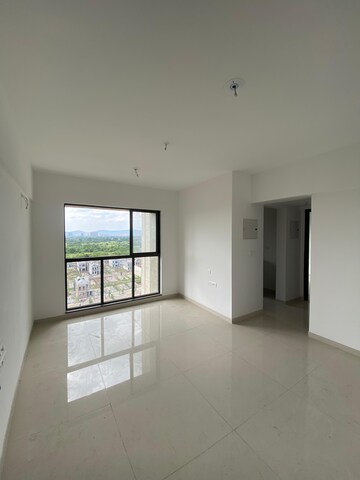 Living Room in 1 BHK Apartment at Lodha Palava Downtown Dombivli East, Dombivli East – for Rent