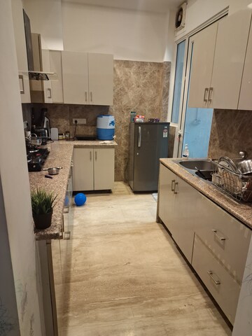 Kitchen in 3.5 BHK Apartment at Ansal API Esencia, Sector 67 – for Rent