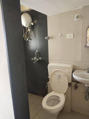 Bathroom in 2 BHK Apartment at Akruti Hubtown, Mira Road – for Rent