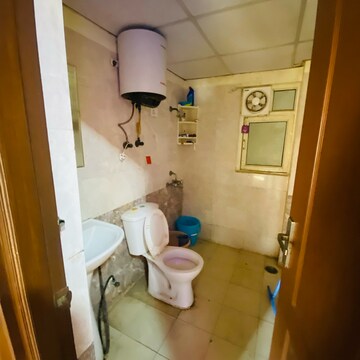 Bathroom in 2 BHK Apartment at Aims Golf Avenue I, Sector 75 – for Rent