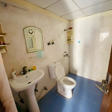 Bathroom in 2 BHK Apartment at Aims Golf Avenue I, Sector 75 – for Rent