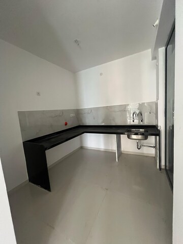 Kitchen in 2 BHK Apartment at Dosti Greenscape, Hadapsar – for Sale