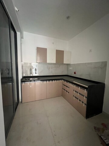 Kitchen in 3 BHK Apartment at Dosti Greenscape, Hadapsar – for Sale