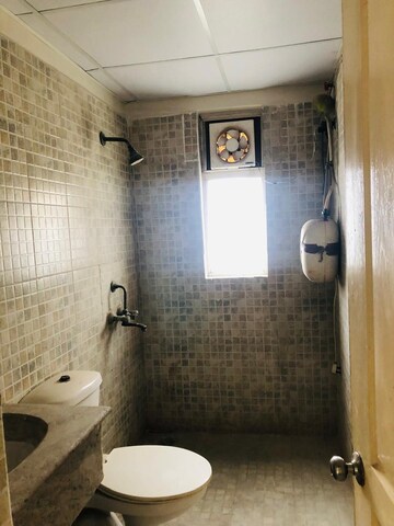 Bathroom in 2 BHK Apartment at Paras Tierea, Sector 137 – for Rent