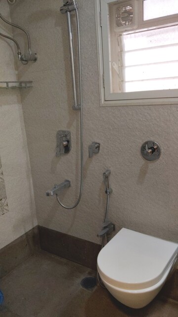 Bathroom in 2 BHK Apartment at Vile Parle East – for Sale