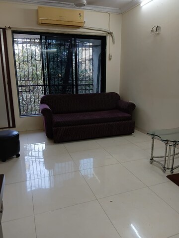 Living Room in 1 BHK Apartment at Vile Parle East – for Rent