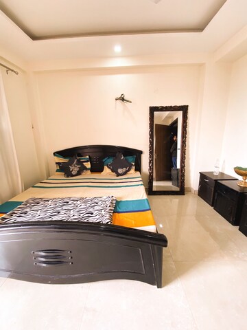 Bedroom in 3 BHK Builder Floor at Ansal Sushant Lok I, Sector 43 – for Rent