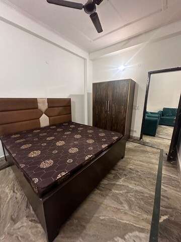 Bedroom in 2 BHK Builder Floor at Palm Residency Chhatarpur, Chattarpur – for Rent