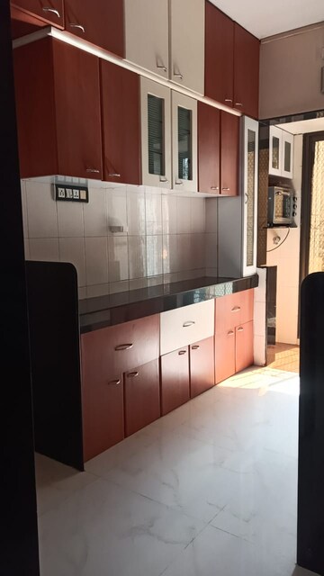 Kitchen in 3 BHK Apartment at Blue Elegance, Malad West – for Rent