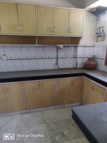 Kitchen in 4 BHK Apartment at Rohini Sector 13 – for Sale