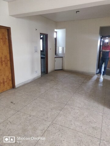 Living Room in 4 BHK Apartment at Rohini Sector 13 – for Sale