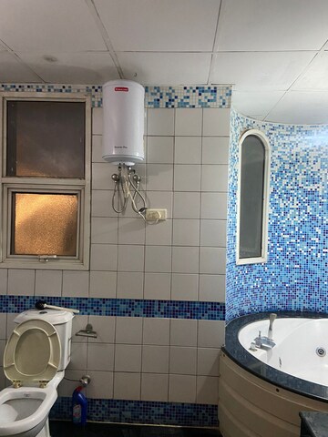 Bathroom in 3.5 BHK Apartment at Omaxe The Nile, Sector 49 – for Rent