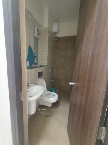 Bathroom in 1 BHK Apartment at UK Luxecity, Kandivali East – for Rent