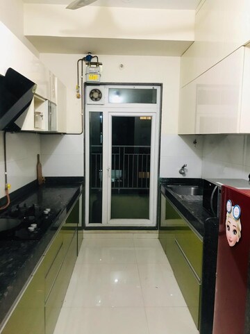 Kitchen in 2 BHK Apartment at Rustomjee Azziano Wing E, Majiwada – for Sale