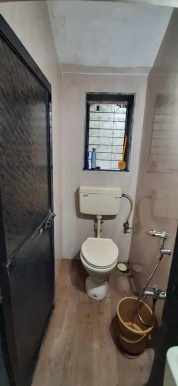 Bathroom in 2 BHK Apartment at Om Shri Ganesh Krupa CHS, Kalwa – for Rent