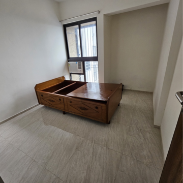 Living Room in 1 BHK Apartment at Lodha Quality Home Tower 5, Balkum Pada – for Sale