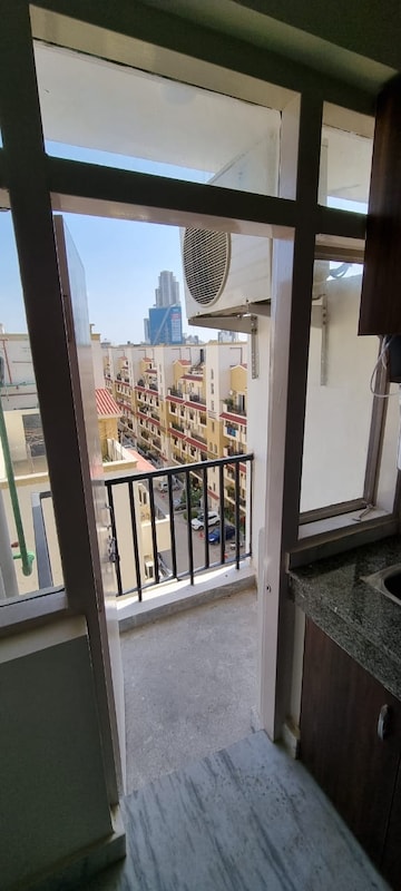 Balcony in 1 RK Apartment at Emaar Emerald Floors Premier, Sector 65 – for Rent