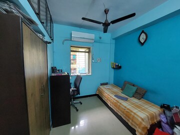 Master Bedroom in 1 BHK Apartment at Om Sudama CHS, Kalwa – for Sale