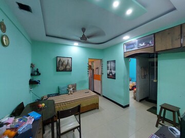 Master Bedroom in 1 BHK Apartment at Om Sudama CHS, Kalwa – for Sale