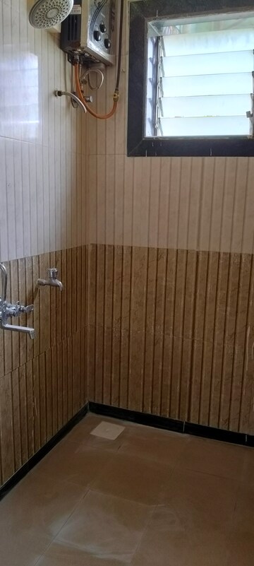 Bathroom in 2 BHK Apartment at Sai Sangh CHS, Nerul – for Rent