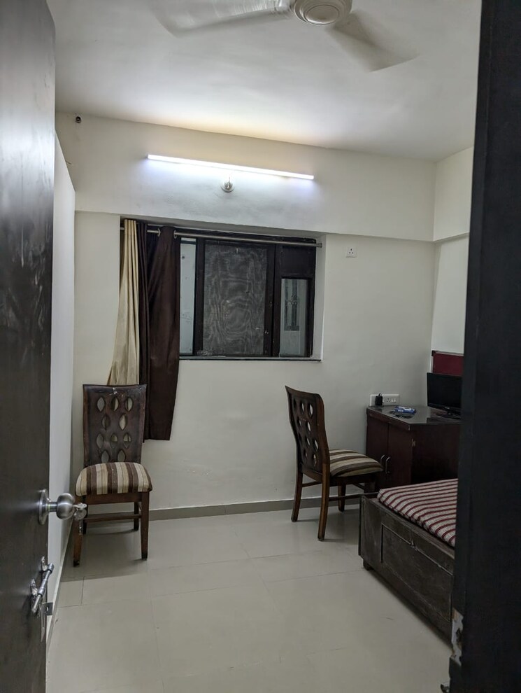 Living Room, ganadhish-empire-chsl 2 Bedroom 750 Sq.Ft. Apartment In Pimple Saudagar Pune 7913785