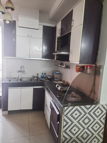Kitchen in 4 BHK Apartment at Great Value Sharanam, Sector 107 – for Sale
