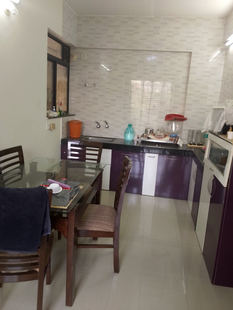 Kitchen, crossover-county 2.5 Bedroom 1100 Sq.Ft. Builder Floor In Nanded Pune 7914104