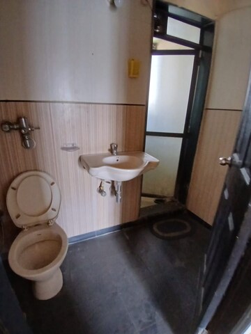 Master Bedroom in 2 BHK Apartment at Lalani Residency, Kavesar – for Rent