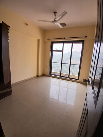 Room in 2 BHK Apartment at Lalani Residency, Kavesar – for Rent