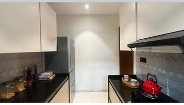 Kitchen in 2 BHK Apartment at NRI Complex Phase I, Seawoods Sector 58 – for Rent