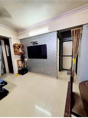 Room in 2 BHK Apartment at NRI Complex Phase I, Seawoods Sector 58 – for Rent