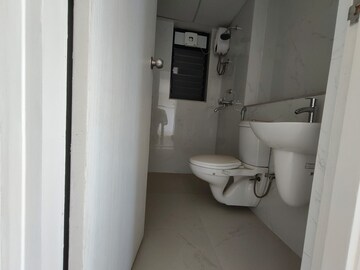 Bathroom in 2 BHK Apartment at Runwal Gardens Phase I, Dombivli East – for Rent