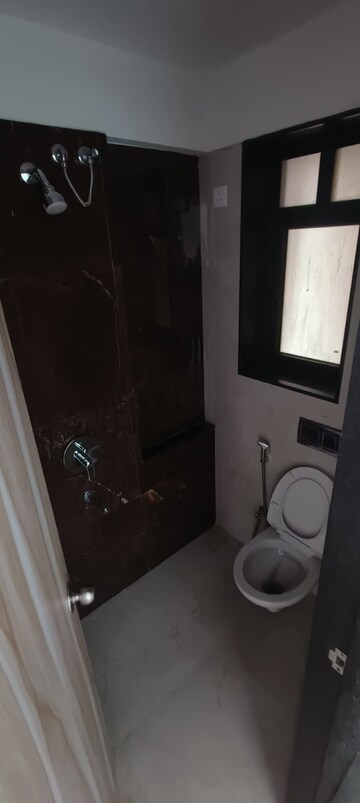 Bathroom in 1 BHK Apartment at MICL Aaradhya Highpark, Mira Road – for Rent