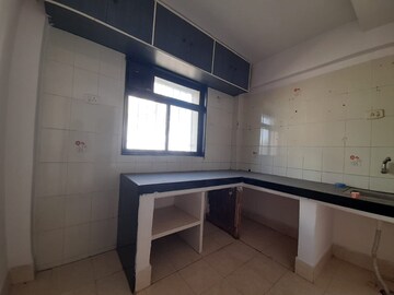 Kitchen in 1 BHK Apartment at Mantri Park, Goregaon East – for Sale