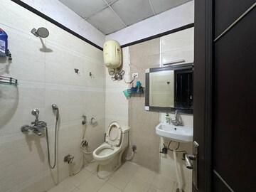Bathroom in 3 BHK Builder Floor at Bharti Apartments, Shakti Khand iv – for Rent