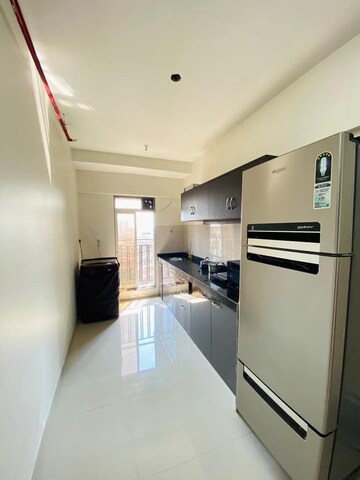 Building Lobby in 2 BHK Apartment at Lokhandwala Whispering Palms, Kandivali East – for Rent