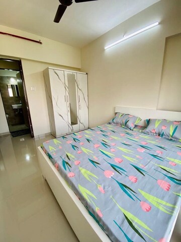 Bedroom in 2 BHK Apartment at Lokhandwala Whispering Palms, Kandivali East – for Rent