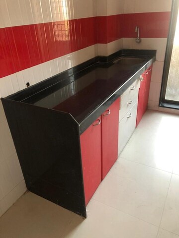 Kitchen in 2 BHK Apartment at Laxmi Avenue D Global City Ph-1, Virar West – for Sale