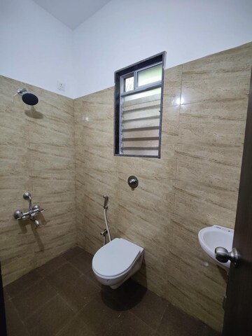 Bathroom in 1 BHK Apartment at Metro Luxuria, Dombivli East – for Sale