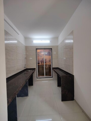 Kitchen in 1 BHK Apartment at Metro Luxuria, Dombivli East – for Sale