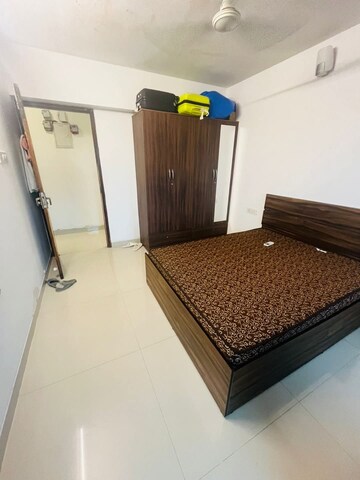 Bedroom in 2 BHK Apartment at Godrej Tranquil, Kandivali East – for Rent
