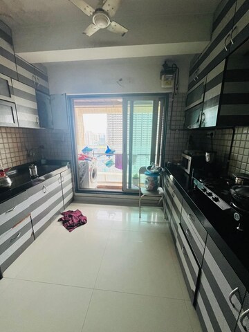 Kitchen in 2 BHK Apartment at Godrej Tranquil, Kandivali East – for Rent