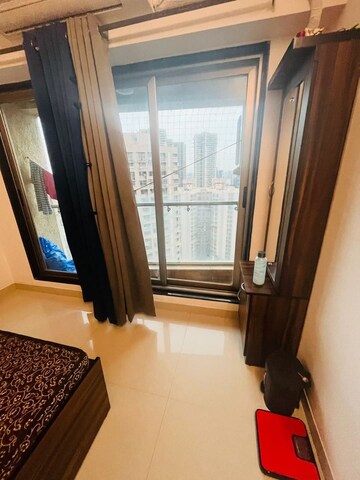 Living Room in 2 BHK Apartment at Godrej Tranquil, Kandivali East – for Rent
