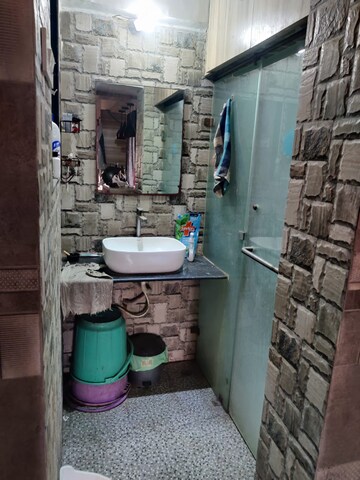 Bathroom in 1 BHK Apartment at Royal Palms, Goregaon East – for Rent