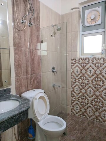 Bathroom in 4 BHK Builder Floor at Ansal API Esencia, Sector 67 – for Sale