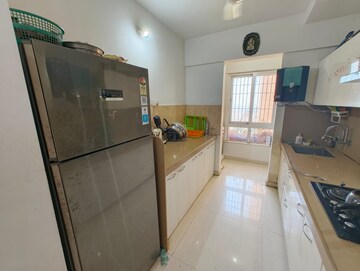 Kitchen in 3 BHK Apartment at Puranik Rumah Bali, Ghodbunder Road – for Sale