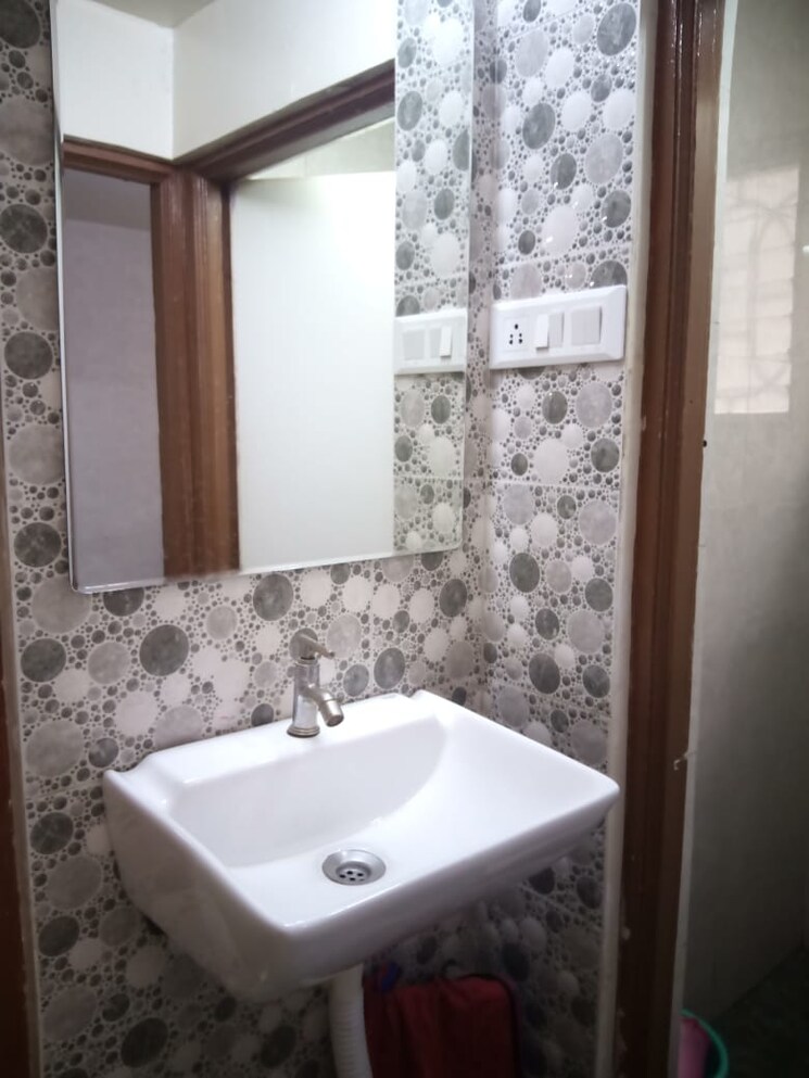 Bathroom, ganraj-aangan-society 1 Bedroom 595 Sq.Ft. Apartment In Wadgaon Sheri Pune 7915849
