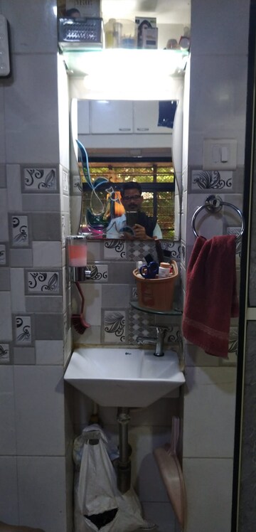 Bathroom in 2 BHK Apartment at Muktai CHS, Sion – for Sale