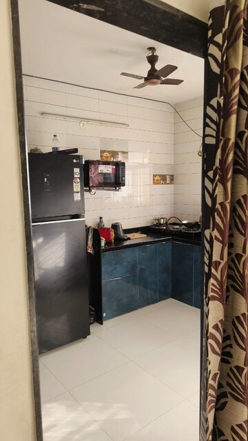 Kitchen in 2 BHK Apartment at Khode Nagar – for Sale