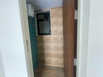 Bathroom in 1 BHK Apartment at Lodha Quality Home Tower 2, Balkum Pada – for Rent